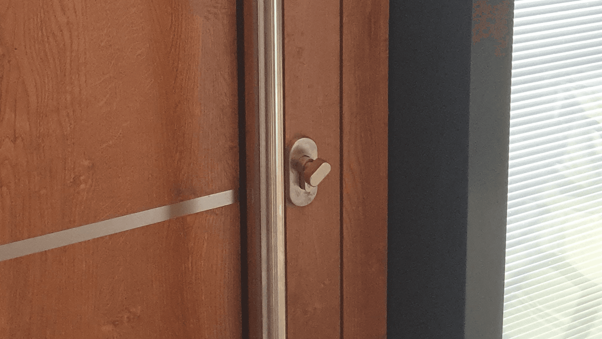 Newcastle locksmith repairing a complex aluminium door lock