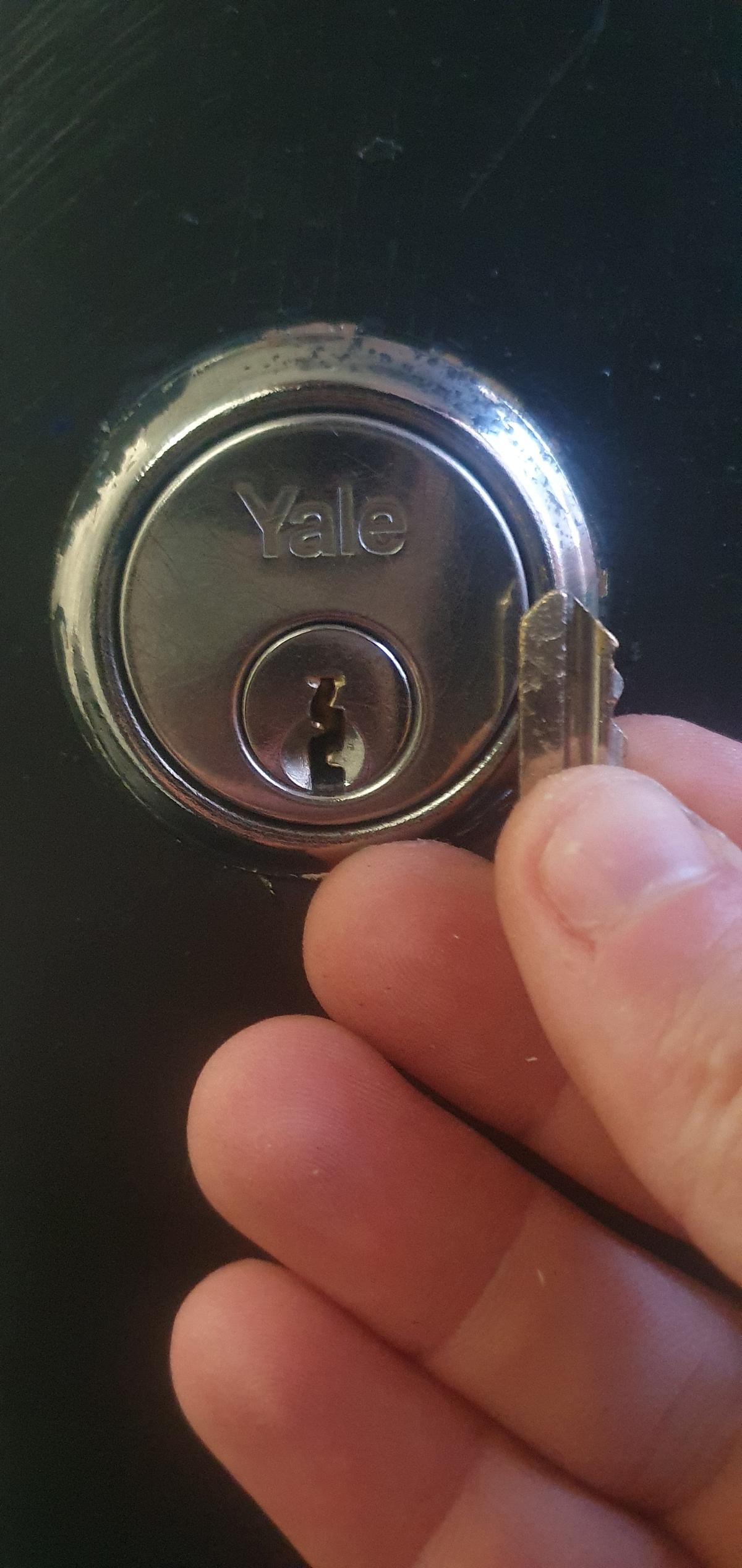 A photo of a broken in in a lock to be extracted by an emergency locksmith