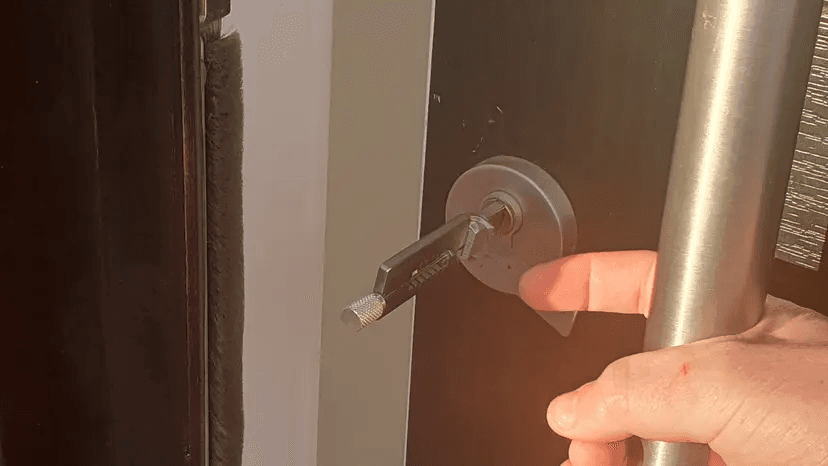 AD Locksmithing in Newcastle opening a door non-destructively, important for lockouts auto locksmith services and vehicle entry