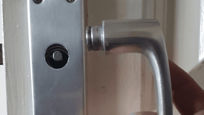 A broken door handle in newcastle fixed by an emergency locksmith