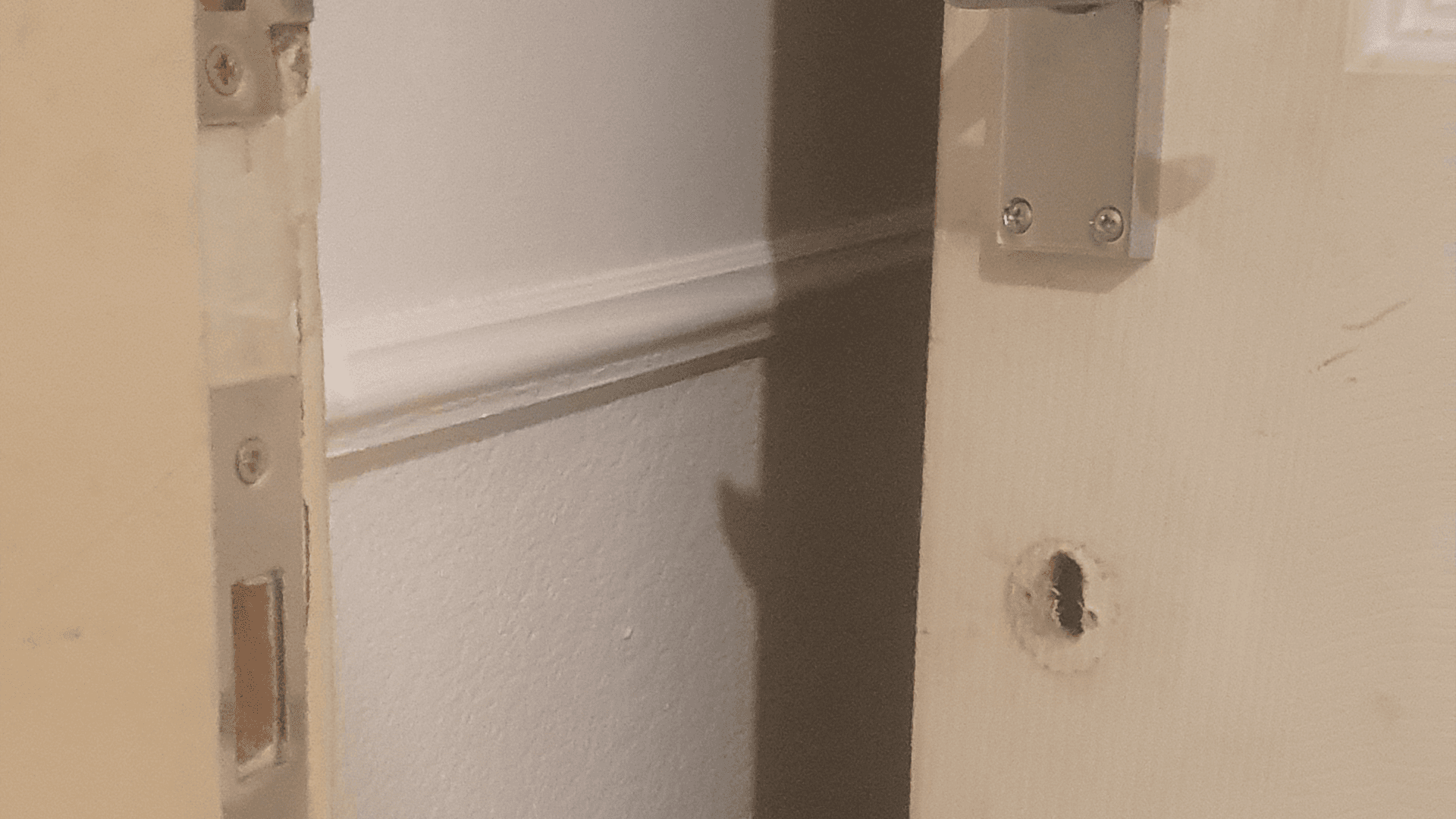 A photo showing the Bedroom door opened by an emergency locksmith AD Locksmithing