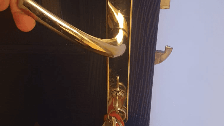 Checking door alignment and strike plate positioning