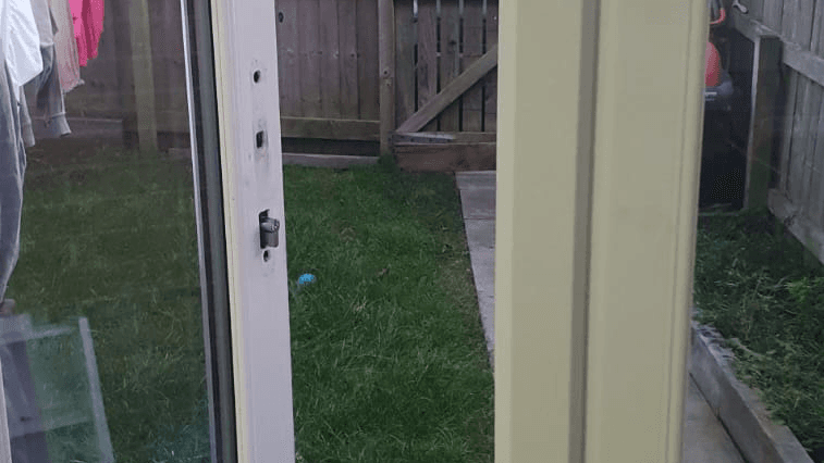 Cleaning internal components of a door lock to prevent jamming