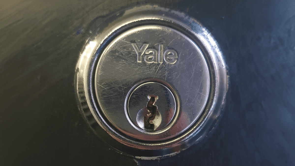 A picture a broken key in a lock