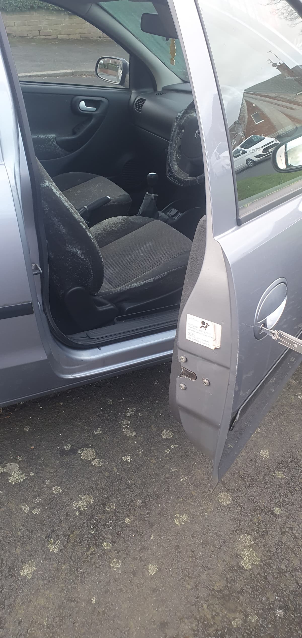 Professional Locksmith Services A car door unlocked by AD locksmithing